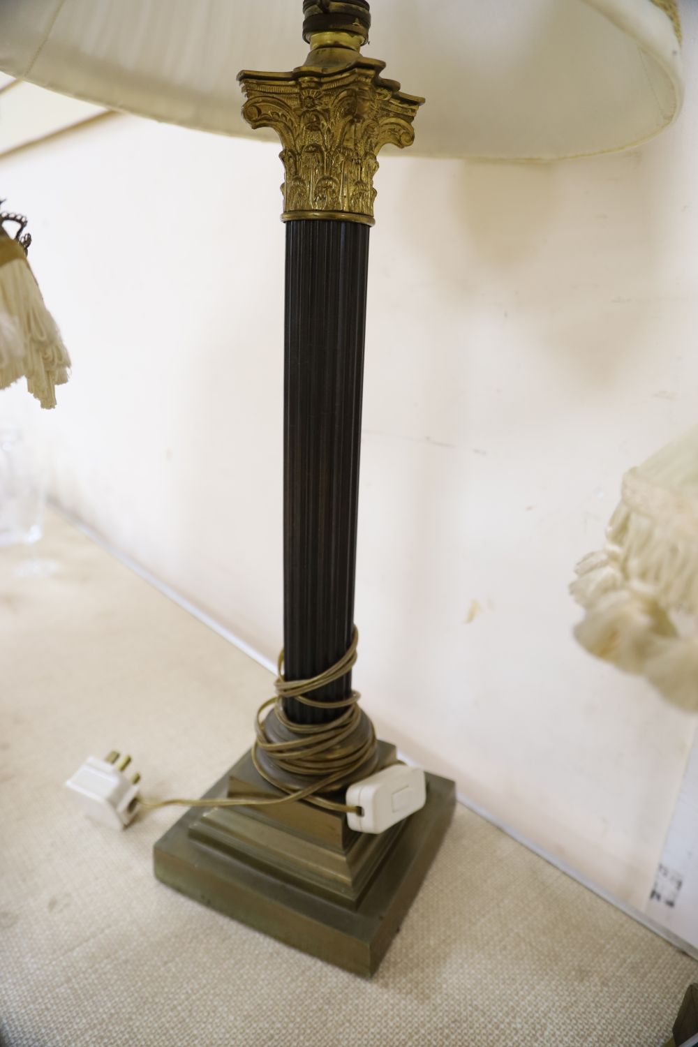 Three Corinthian column table lamps and two others